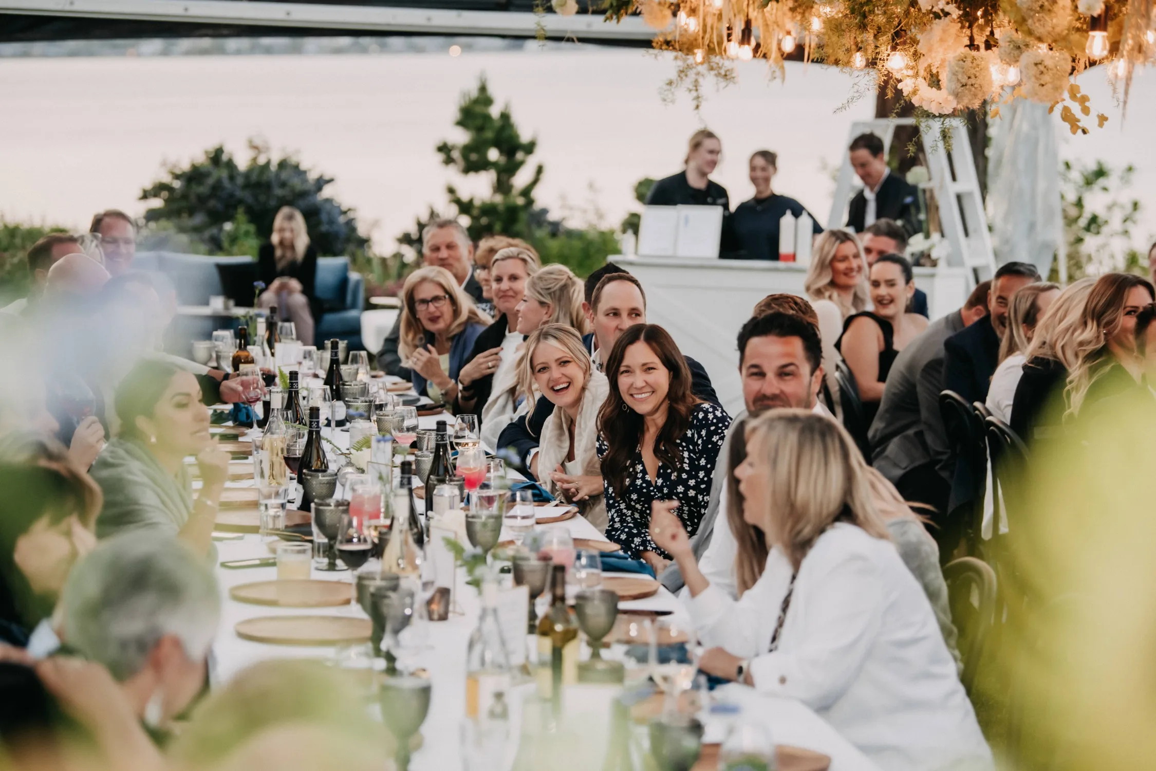 Guests sharing dinner at the inaugural Oceanside Dining For A Cause event